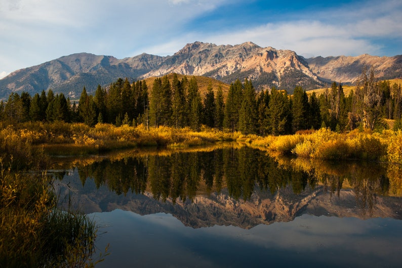 Boulder Mountains Reflection, Idaho. Sunset on the Boulder Mountains on a fall day full of color, just north of Sun Valley and Ketchum on the road to Stanley.