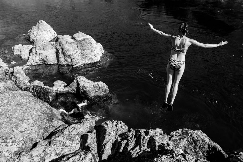 Christ Pose Cliff Jump. Mykelti Blackburn styles a cliff jump.