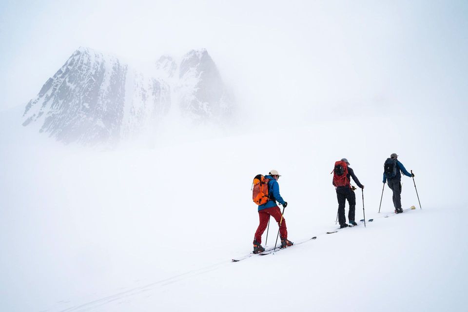 Into the Clouds. Skiing in low visibility beats no skiing. Nexus Peak, British Columbia.