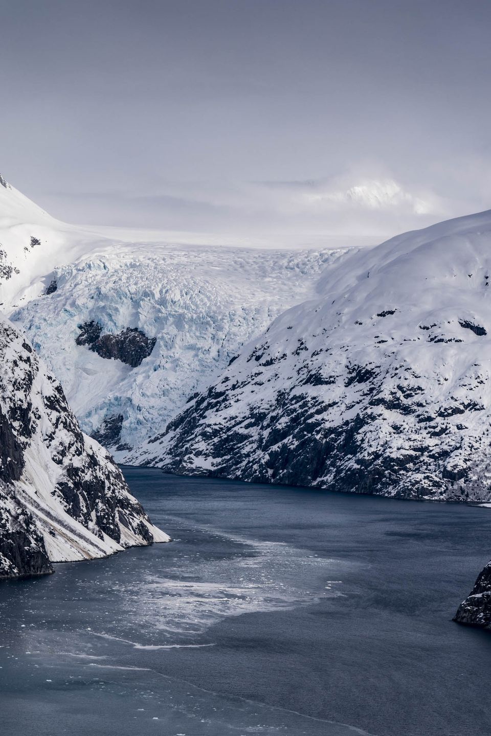 Northwestern Fjord. A hundred years ago the glacier filled the Northwestern Fjord in Kenai Fjords National Park. Today the ice has melted back onto land.