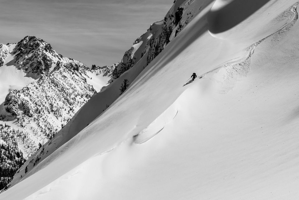 Skiing in Wilderness. High in Idaho's wilderness on a sunny day, Matt Leidecker descends Mt. Regan.