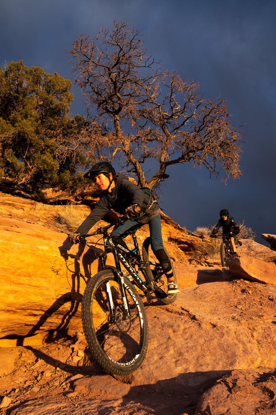 Sunset on Falcon Flow, Moab. One of Moab's newest trails gives riders incredible light as they head west into the sunset.